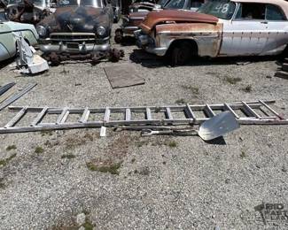 666 Little Giant Folding extension ladder, shovel, and pitchfork