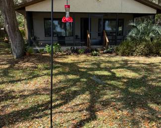 Hummingbird feeder and pole