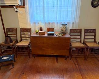 Drop leaf table and four matching antique chairs