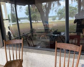 On porch pressed back antique chairs