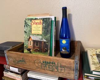 Books, crate, bottle