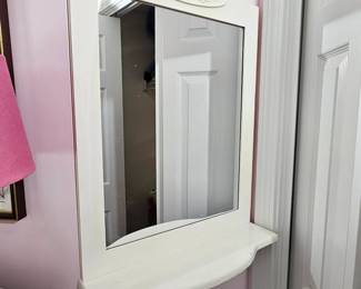 Small white mirror with shelf 