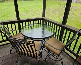 Glass Top Table with 3 Black Metal Chairs 