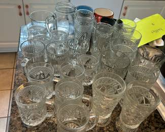 Glasses of assorted size, shape, design