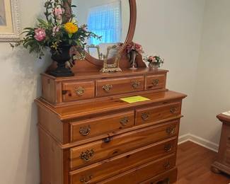 Dresser with oval mirror