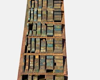 Antique printing press furniture case.