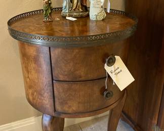 We have two of the barrel-shape tables