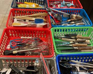 So many handy utensils including two flats of kitchen knives and sharpeners