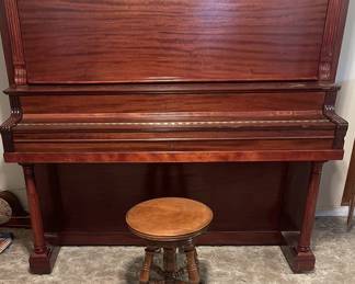 Very beautiful piano with piano stool