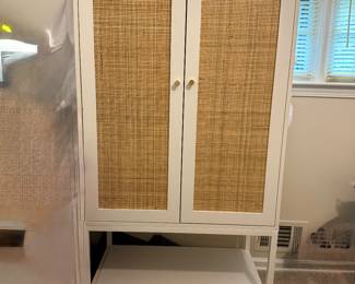 Wardrobe with clothing bar inside