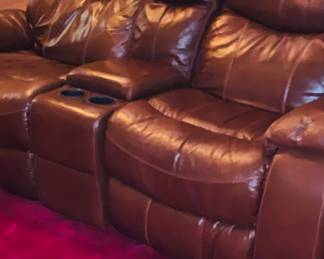 Pair of leather recliners with drink holders