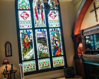 home features a very large 15' original 1895 stained glass church window from the Isle of Bute, off the coast of Scotland--worth the trip