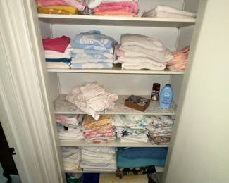 lots of towels, hand towels, and bedding