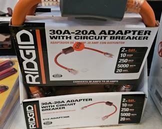 ADAPTER WITH CIRCUIT BREAKER