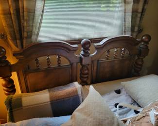 Awesome wooden queen size bed frame with mattress and box spring.