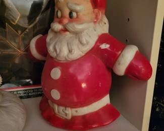 Vintage Hard Plastic Flocked Tin Back Santa.