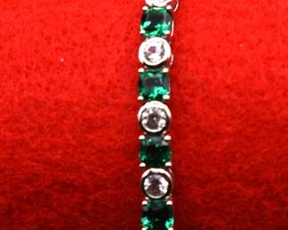 Elegant emerald and white lab created sapphire bolo bracelet