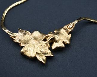 Trifari gold tone necklace with enamel flower