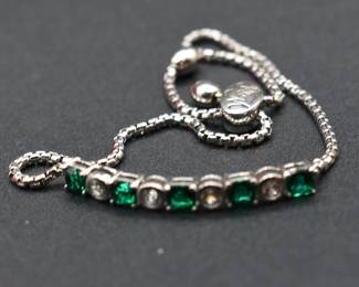 Elegant emerald and white lab created sapphire bolo bracelet