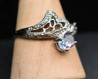 Natural tanzanite and diamond accent designer ring