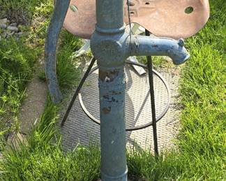 ANTIQUE CAST IRON PUMP & TRACTOR SEAT STOOL
