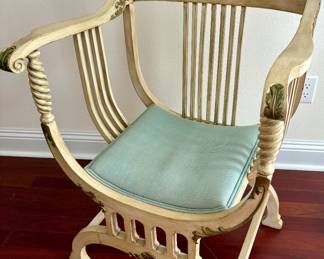 Elegant Saddle Seat Chair $175