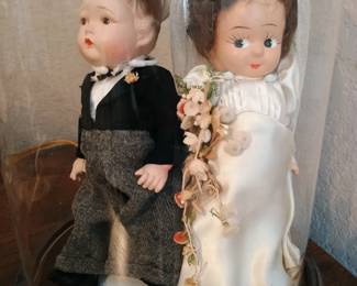 Bride and groom collectibles and cake toppers
