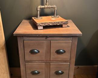 Small cabinet , several industrial style lamps