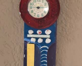 Artist made wall clock.