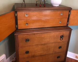 1900s tall boy dresser with tole painting and hidden drawers. Great quality. Available for pre sale on FB Marketplace.