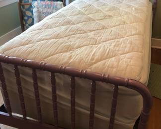 Vintage purple head and footboards twin bed. Includes mattress and box springs. Available for pre sale on FB Marketplace.