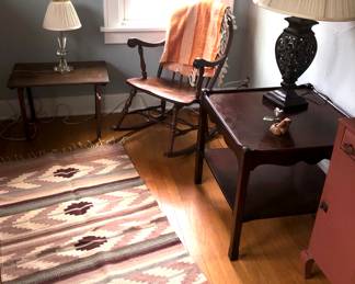 Vintage rocking chair with side tables.