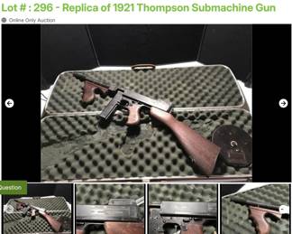Lot # : 296 - Replica of 1921 Thompson Submachine Gun
Number 0801 model of a 1921 submachine gun with drum and stick magazine and carry case. Produced by MGC Model Gun Corporation of Tokyo Japan.