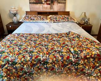Mid-Century headboard and nice mattress. Comforter is handmade!