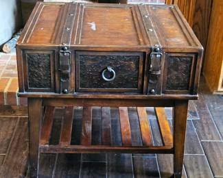 Decorative Dark Wood Tone End Table with Embossed Tin Side Panels and Leather-Like Straps