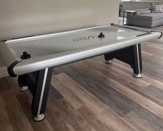 Brunswick V-Force air hockey table. Full specs at: https://www.brunswickbilliards.com/products/v-force-2-0-air-hockey-table