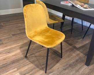 Velvet chair with black legs (4x). One has a tiny, contained tear in it.