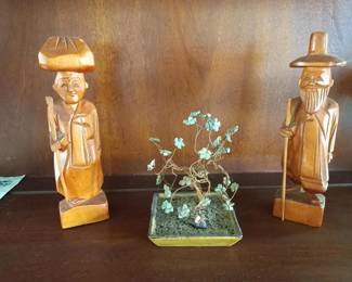 Wooden figurines with jade plant