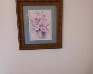 Framed floral artwork with wooden frame