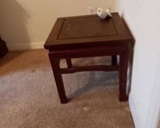 Wooden side table with square top