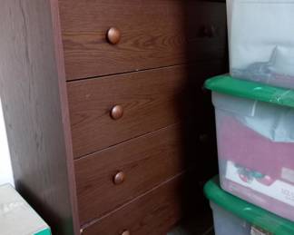 Small wooden chest of drawers with four drawers