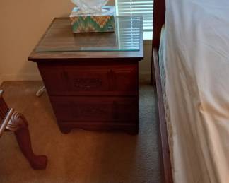 Wooden nightstand with drawer and storage compartment