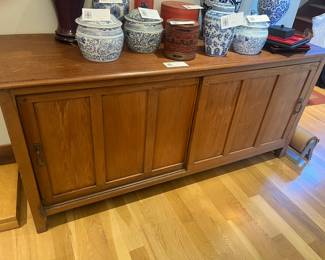 $480. Two door sideboard cabinet. Two shelves behind the doors. 72"w x 23.5" 33"h. Available for online buying Wednesday per instructions in sale details.