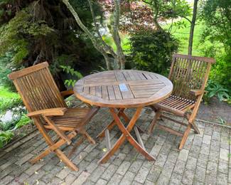 $320. Teak three piece set. Tabl is 36" diameter x 29.5"h. Table and chairs fold for storing. Chairs need tightening - screws easily accessible. Available for online buying Wednesday per instructions in sale details.