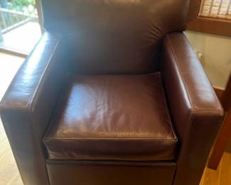 $400. Leather armchair and ottoman. Chair is 34"w x 32.5"d x 33.5"h. Ottoman is 21"w x 22.5'D X 17.5"H.