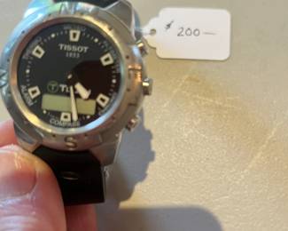 $200. Tissot watch. Available for online buying Wednesday per instructions in sale details.