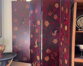 $280. Four panel painted screen with floral motif on front, solid red n the back. Each of the four panels is 16" w x 84"h. as found- a couple hinges need tightening or replacing to make it more secure.