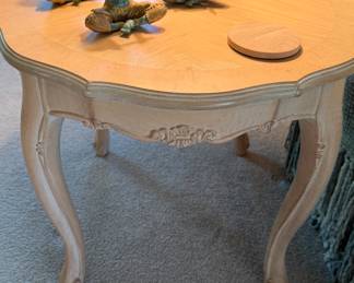 Cream Colored Round Side Table with Cabriole Legs and Carved Details