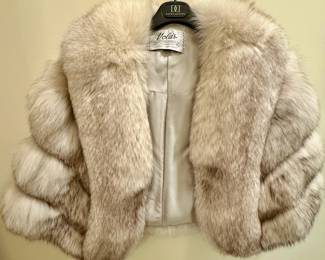 Vola's fox fur cape
