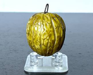 Antique German measuring tape in the form of a walnut
